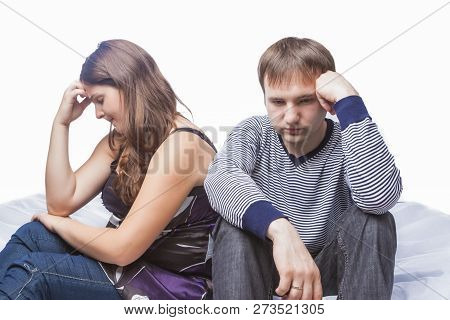 Concept Of Family Conflict. Young Caucasian Couple On Divorce Edge. Posing On White In Studio. Horiz