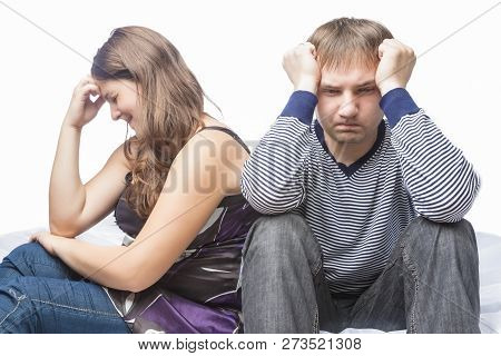 Concept Of Family Conflict. Young Caucasian Couple On Divorce Edge. Posing On White In Studio. Horiz