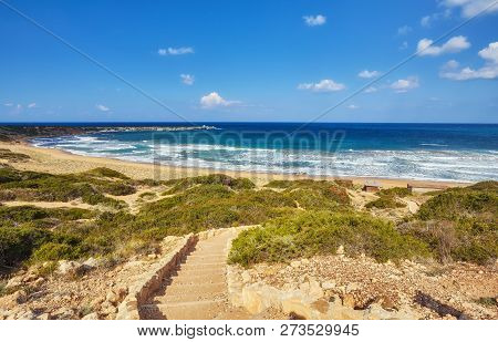 Beautiful Wild Beach With Clear Turquoise Water And Waves. Lara Beach, Cyprus.