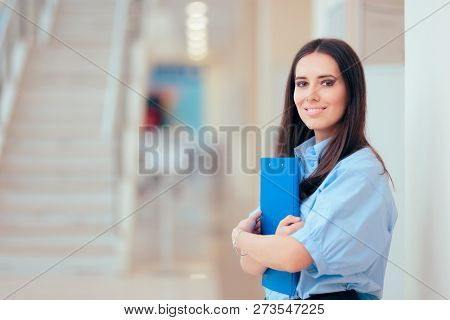 Professional Woman Holding Folder In Office Building