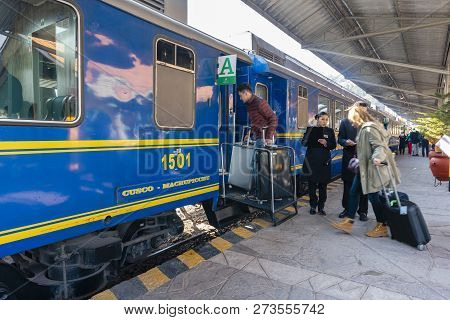 Cusco, Peru - Sep 13, 2018: Tourists Boarding A Train To Machu Picchu At A Railway Station In Cusco