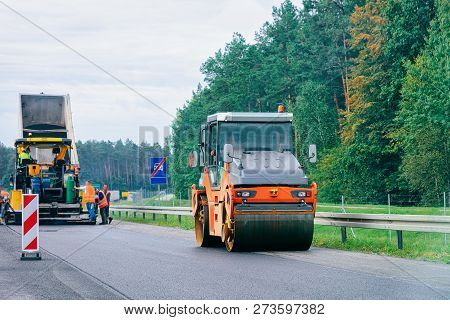Road Roller On The Highway Road In Poland.