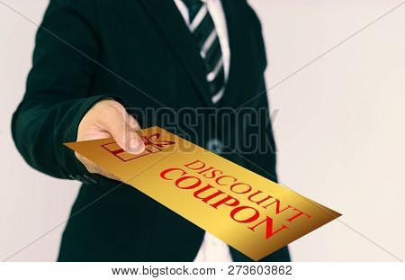 Discount Coupon Concept. Businessmen Send Gold Discount Card.