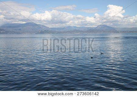 Blue Lake And Clouds In The Mountains