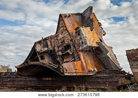 Huge Rusty Pieces Of Decommissioned Marine Ship That Was Cut And Left On The Shore.
