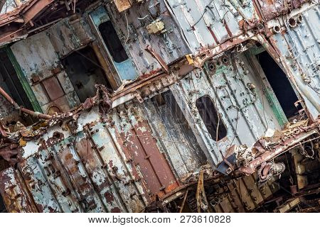 Internal Parts Of Decommissioned Marine Ship That Was Cut And Left On The Shore.