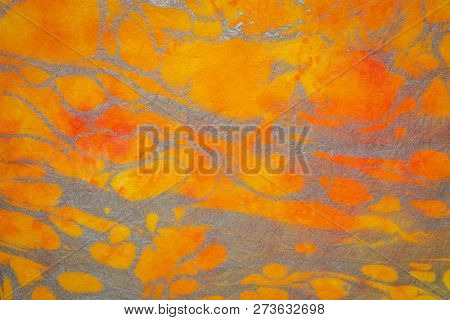 background of textured handmade Thai marbled momi mulberry paper with a random pattern