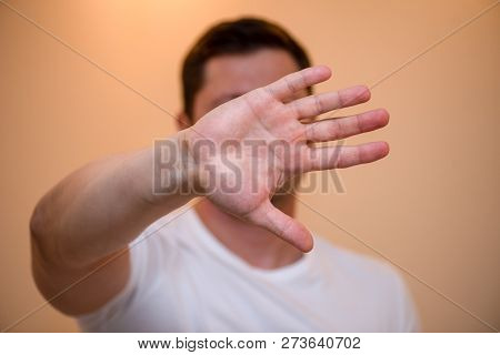 Serious Disgruntled Man With Shows Stop Sign