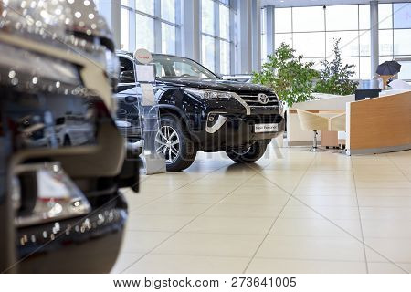 Russia, Izhevsk - October 20, 2018: Showroom Toyota. New Toyota Fortuner In Dealer Showroom. Modern 