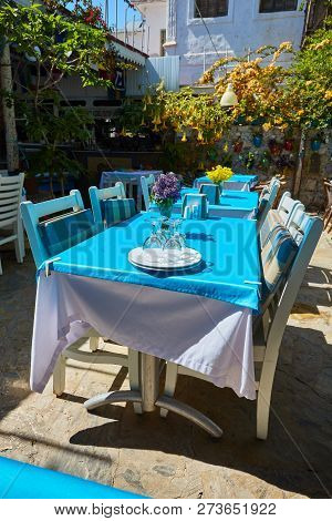 A Nice Table Near The Sea With Flowers At Simena Ucagiz , Kas, Turkey