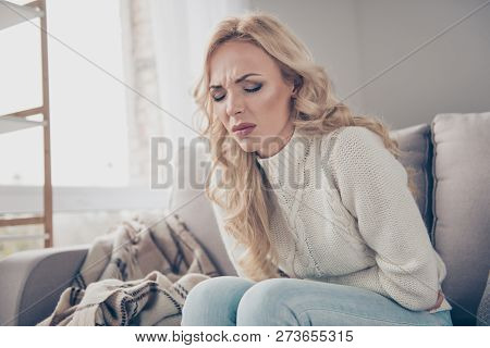 Portrait Of Nice Attractive Glamorous Stylish Gloomy Wavy-haired Lady Wife Housewife In Sweater Sitt