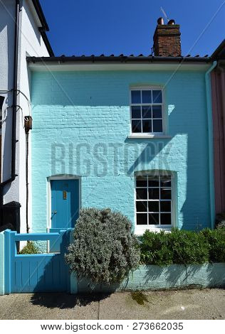 Aldeburgh, Suffolk, England - May 05, 2018: Terrace Cottage Painted Mint Green In Aldeburgh.