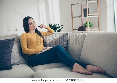 Nice Lovely Slim Winsome Attractive Curious Creative Smart Clever Girl Sitting On Divan Fantasizing 