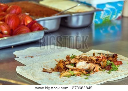 Istanbul Street Food Doner Kebab Made Of Meat Cooked On A Vertical Rotisserie. Traditional Turkish D