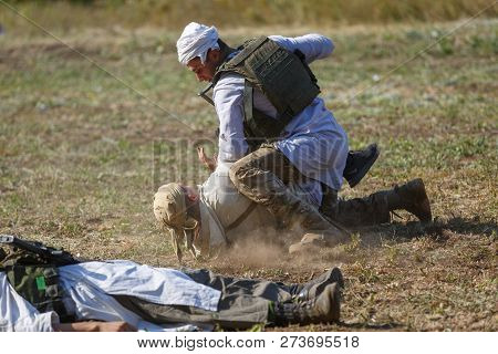 Sambek, Rostov Region, Russia, August 19, 2018: Reconstruction Of Afghan War. Hand-to-hand Fight Bet