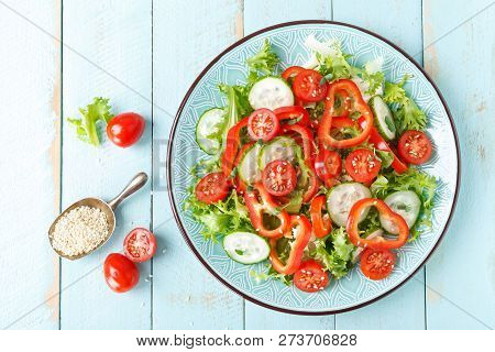 Healthy Vegetarian Vegetable Salad Of Fresh Lettuce, Cucumber, Sweet Pepper And Tomatoes. Vegan Plan