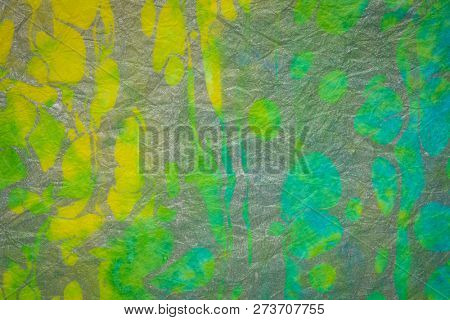 background of textured handmade Thai marbled momi mulberry paper with random pattern