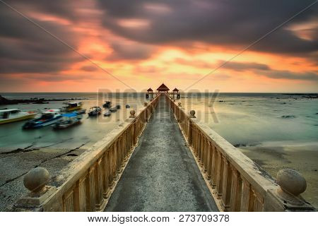 A Long Exposure Of A Stone Jetty Leading Into The Sea During Monsun Season, Tanjung Balau,johore,mal
