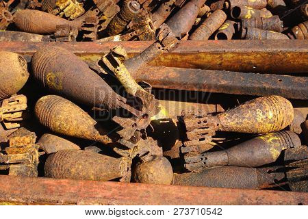 Closeup Of Rusty Salvaged Unexploded Bombs And Munitions Casings On Display In Rural Xieng Khouang P