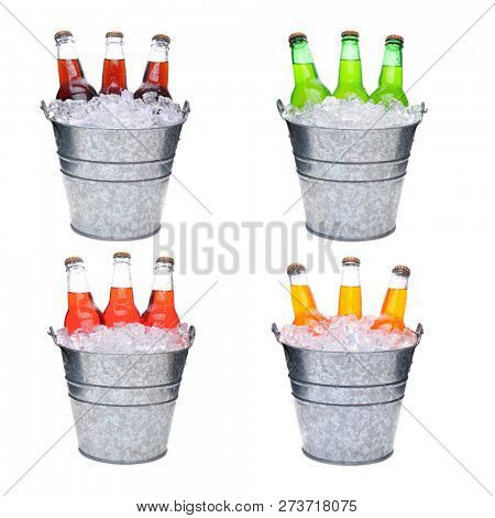 Four ice Buckets Filled with three soda bottles, each pail has a different flavored soft drink, Lemon-Lime, Cola, Orange and Strawberry.