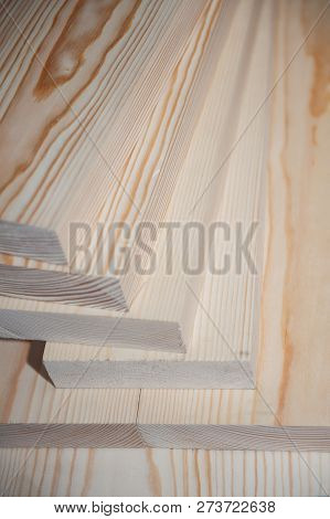 Wood Boards. Timber In Stock. Many New Boards In Stock. Planed Boards Are Stacked.