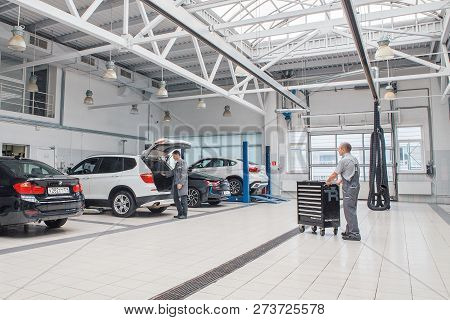 Car Repair, Bmw Advertising, Moscow, 1.11.2018: Bmw Motor Company Badge On The Front From A Black Ca