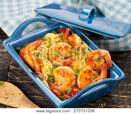 Stir-fried Spaghetti With Grilled Shrimps And Tomatoes - Italian Fusion Food Style.