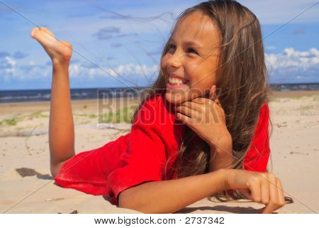Flicka på Sand