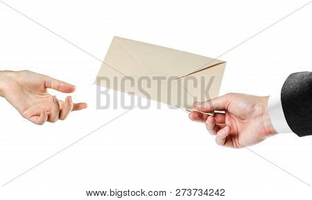 The Hand Passes The Envelope. Close Up. Isolated On White Background.