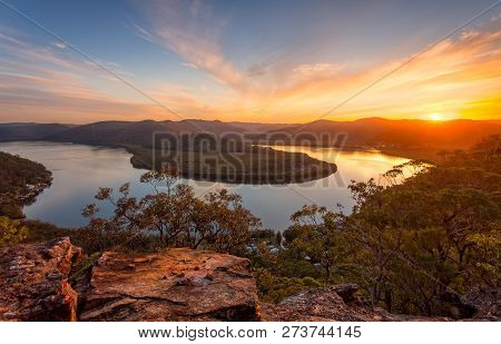 Sunset Views Across The River As It Snakes Through The Landscape