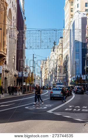 Madrid, Spain - December 6, 2018: Gran Via Avenue With Christmas Decoration A Sunny Day