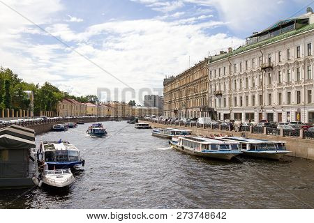Saint-petersburg, Russia - August 7th, 2018: View Of The Moika River Embankment From The Green Bridg