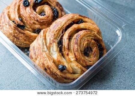 Danish Spiral Cinnamon Raisin Roll / German Pastry Schnecken In Plastic Box / Container.