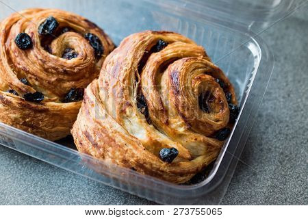 Danish Spiral Cinnamon Raisin Roll / German Pastry Schnecken In Plastic Box / Container.