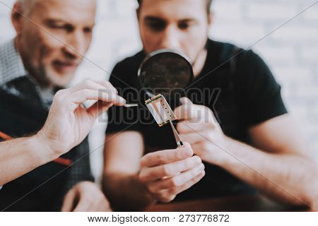 Two Men Repairing Hardware Equipment From Pc. Repair Shop. Worker With Tools. Computer Hardware. You