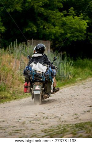 Couple Riding A Motorcycle, Traveling By Country. Travel, Adventure And Summer Concept. Couple Ridin