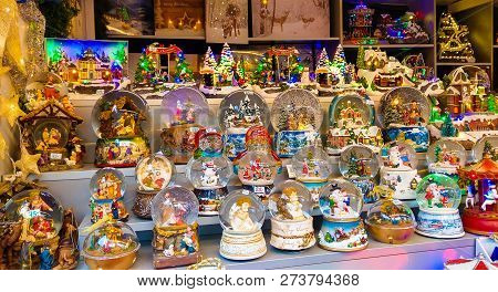 Salzburg, Austria - December 9, 2018: Colored Snowglobes At The Traditional Christmas Market Of Sals