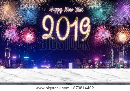 Happy New Year 2019 Fireworks Over Cityscape At Night With Empty White Marlbe Table,banner Mock Up T