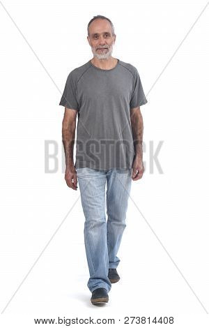 A Middle-age Man Walking On White Background