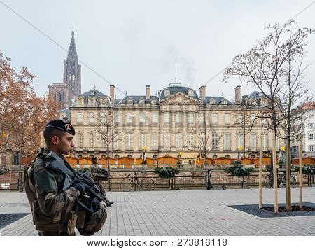 Strasbourg, France - Dec 11, 2018: Police Officers Vigipirates Armed Surveilling Street With Rohan P