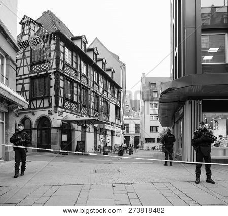 Strasbourg, France - Dec 11, 2018: Armed Police Officers Securing Rue Du Saumon In City Center After