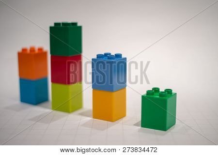 Stacked Plastic Multicolor Blocks In The Graph Arrangement