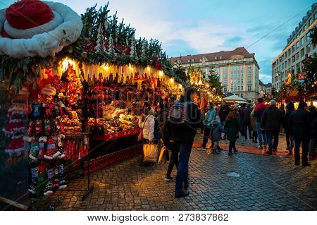 Dresden, Germany - 9.12.2018: People Visit Christmas Market Striezelmarkt In Dresden, Germany. Chris