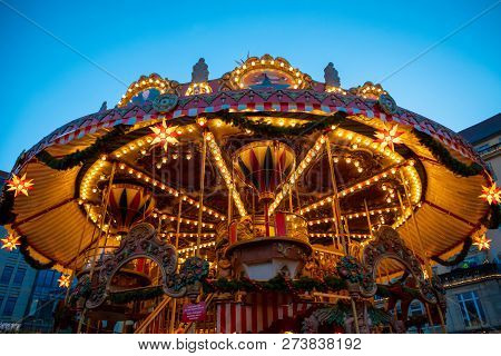 Dresden, Germany - 9.12.2018: Christmas Carousel At Night On Market Striezelmarkt In Dresden In Germ