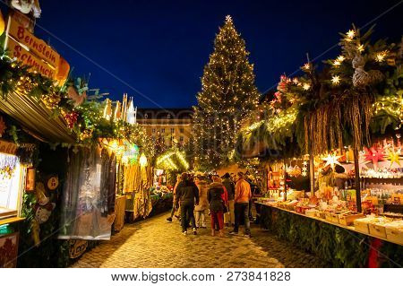 Dresden, Germany - 9.12.2018: People Visit Christmas Market Striezelmarkt In Dresden, Germany. Chris