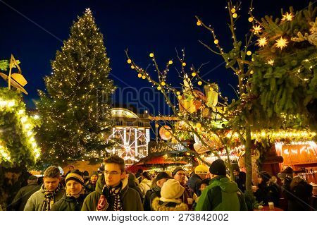 Dresden, Germany - 9.12.2018: People Visit Christmas Market Striezelmarkt In Dresden, Germany. Chris