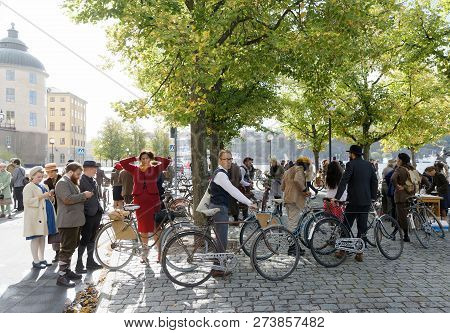 Stockholm - Sept 22, 2018: People Wearing Old Fashioned Tweed Clothes From The 1950s Leading Their R