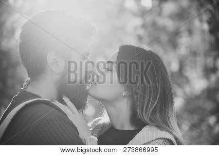 Woman Hugs Man With Beard With Tenderness, Close Up. Couple In Love On Sunny Day With Yellow Leaves 