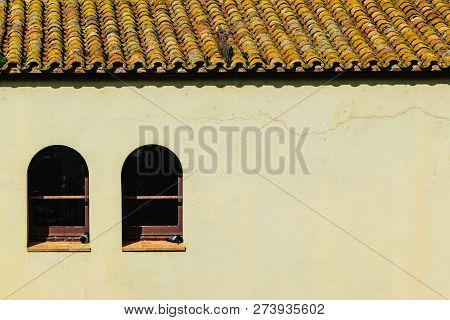 House With Tile Roof And Two Windows Spain