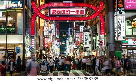 Tokyo, Japan - August 2018: Long Exposure Photo Of People At Kabukicho In The Shinjuku District. The
